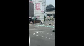 Woman rides scooter stacked with massive load of aluminium cans