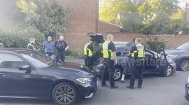 Police arrest male suspects.