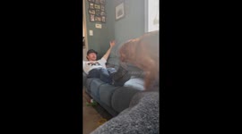 Dog responds to trust fall command without a second of hesitation
