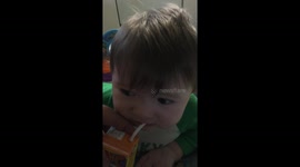 Son tries drink for first time