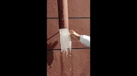 Ice slides out of frozen water pipe with a satisfying drop