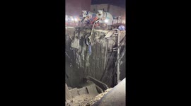 Builders drop cement into Bangkok sinkhole as bungling officials scramble to secure area
