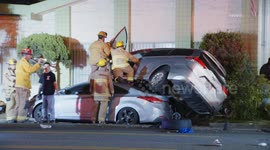 US, Los Angeles: Harvard Heights Vehicle Into Parked Cars