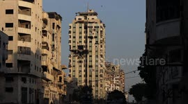 MOMENT - Israeli strike flattens Gaza high-rise sheltering displaced families
