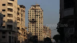 MOMENT - Israeli strike flattens Gaza high-rise sheltering displaced families
