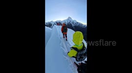 Climber fatally plunges 200 metres after unroping to take photo on China's Mount Nama