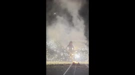 Burmese fire dancer impresses tourists on Thai island Koh Samui