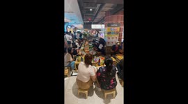 Locals eat multicoloured eggs at new shopping mall in Bangkok
