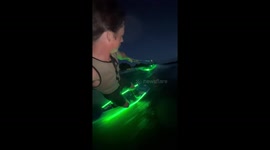Glowing wakeboard lights up the night in Arkansas, USA