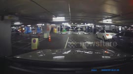 Motorcycle riders hit by parking gate in Bangkok, Thailand