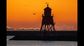 Timelapse video of the sun rising over Herd Groyne Lighthouse in South Shields