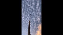Altocumulus clouds at sunrise over weather station in Lake Worth, USA