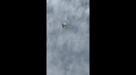 Skydiver Safely Cuts Away From World's Largest Italian Flag