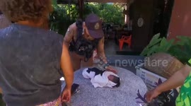 Police search for parents of newborn found abandoned in front of house