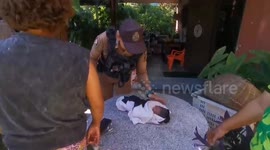 Police search for parents of newborn found abandoned in front of house