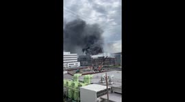 Japan airport fire sends towering plumes of smoke rising from old hangar