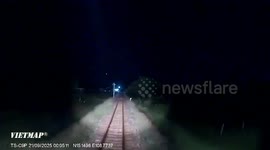 Railway worker drags injured motorcycle rider off tracks as train approaches