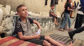 Resilient Palestinian boy fashions prosthetic from plastic pipe after losing leg in airstrike