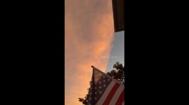 Golden-orange sunset during Tropical Storm Imelda in Buffalo, New York, USA