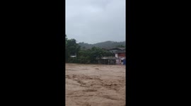 Typhoon Bualoi sweeps villager away in raging floods in northern Thailand