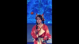 Clown juggles apples and eats them simultaneously