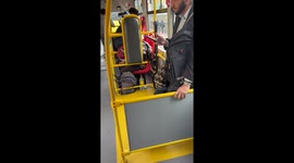 Kitten Sleeping Upside Down on the Bus