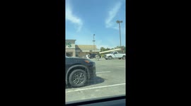 Suave Stranger Saves Runaway Shopping Cart