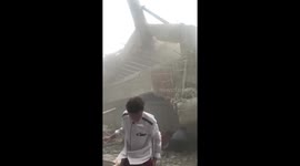 Dozens of pupils trapped in rubble of collapsed school in Indonesia