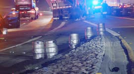 US, Los Angeles: Azusa Tractor Trailer Crashes Spills Beer Cans on Westbound 210 Freeway Part 2