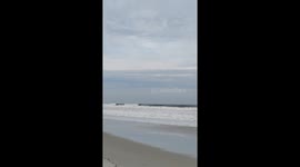 Powerful waves surge ahead of Tropical Storm Imelda in Emerald Isle, USA