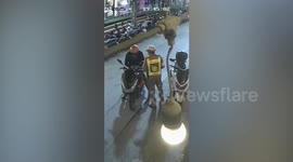 Thai cop caught on CCTV seen 'taking backhander' from tourist stopped at checkpoint