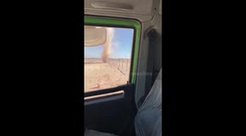 Dust devil tornado whips across field in Chile
