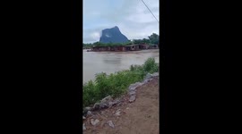 Typhoon Bualoi washes away homes that crash into bridge in Laos