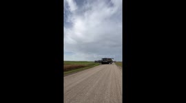 Canola harvest begins with combine harvesters in Manitoba, Canada