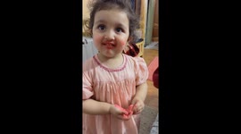 Little girl makes a mess with lipstick in Abbottabad, Pakistan
