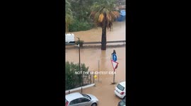 Man rides scooter through floodwaters in Ibiza—Tropical Rainstorm Gabrielle leaves island submerged
