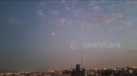 Iran: MiG-29 jet flying over Tehran