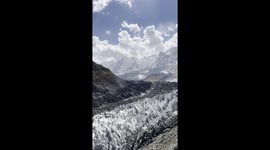 Captured a breathtaking view standing at the foot of Rakaposhi Base Camp, showcasing the majestic Rakaposhi peak along with its stunning glacier.”