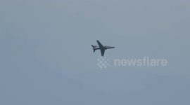 Jet flying over the beach coast in Mandurah, Western Australia. BAE T-45 Goshawk training jet.