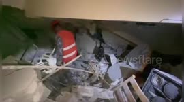 Philippine earthquake rescue teams search rubble of collapsed building