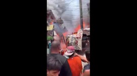 Neighbours press fireman to save engulfed houses despite damage-control efforts