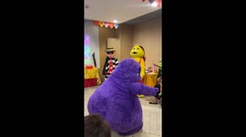 Toddler has had enough of annoying McDonald's mascot and throws punches