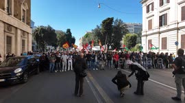 Demonstrators march near Termini station in Rome