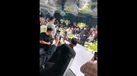 Ring bearer falls asleep on toy car at wedding in Heilongjiang, China
