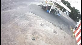 Man at Gas Station Narrowly Avoids Getting Hit by Out-of-Control Vehicle