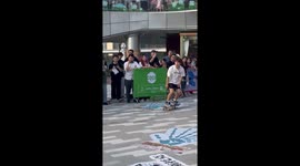 Skateboarder slams hard while trying to grind on bar across pool