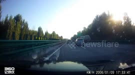 Car loses control and collides with truck in Liaoning, China