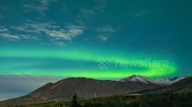 US: Northern lights dazzle night sky over Anchorage, Alaska