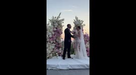 Newlyweds startled by fireworks during wedding kiss in Bodrum, Turkey