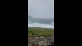 Stormy seas and strong winds at Coumeenoole Beach in Dingle, Ireland